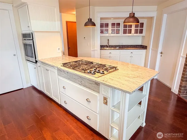 a kitchen view of a stove