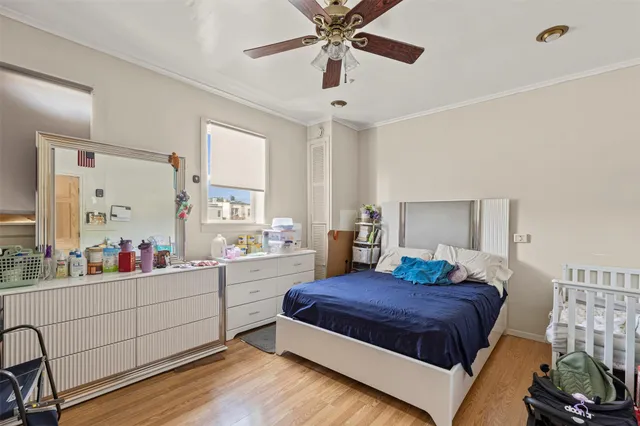 a bedroom with a bed and a closet