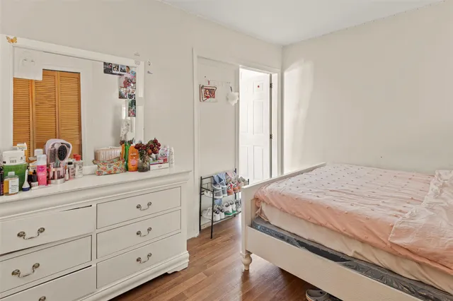 a bathroom with a sink a toilet and shower curtain
