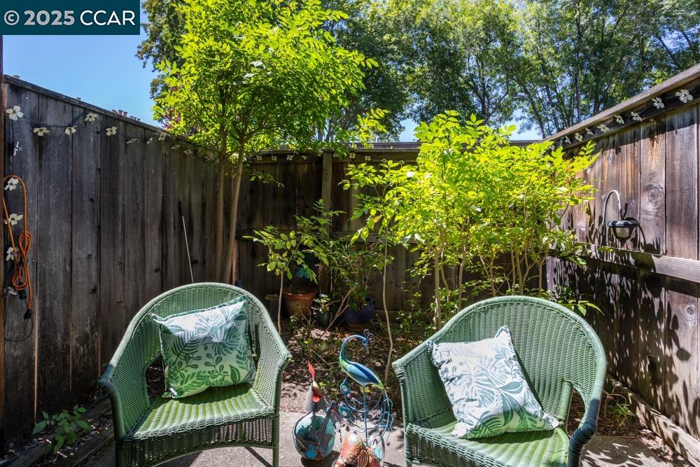 1455 Latour Lane, Unit 43 Concord, CA 94521 - Photo 10 of 17 a backyard of a house with seating space