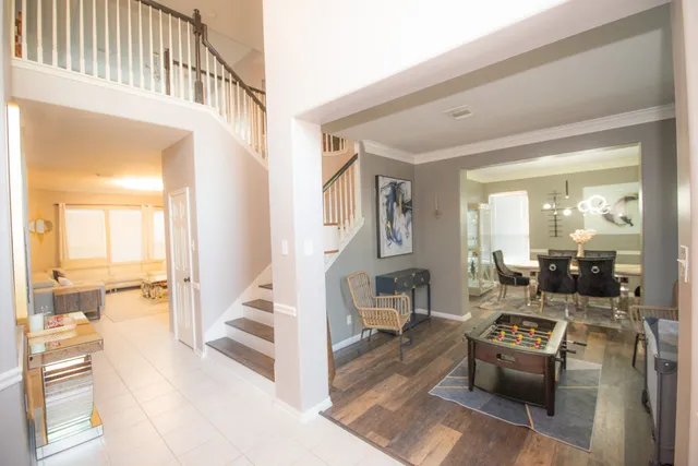 a view of living room and kitchen with furniture