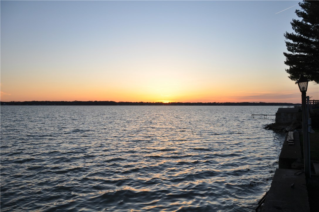 Looking north along the seawall to the setting sun