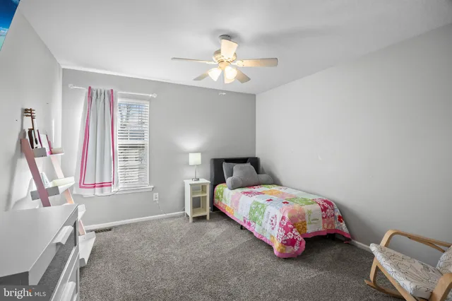 a view of bathroom with bathtub and shower