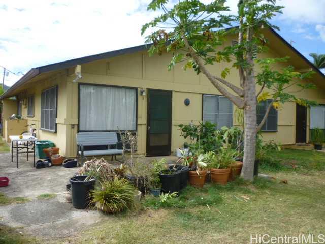 45-77 Waikalua Road, Unit A Kaneohe, HI 96744 - Photo 1 of 1 a backyard of a house with seating space