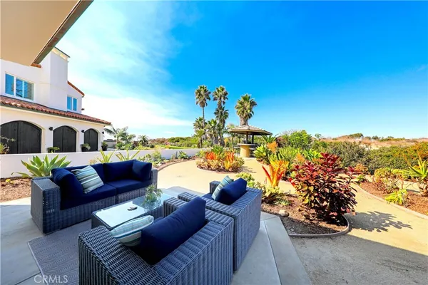 a view of a chairs in patio of the house