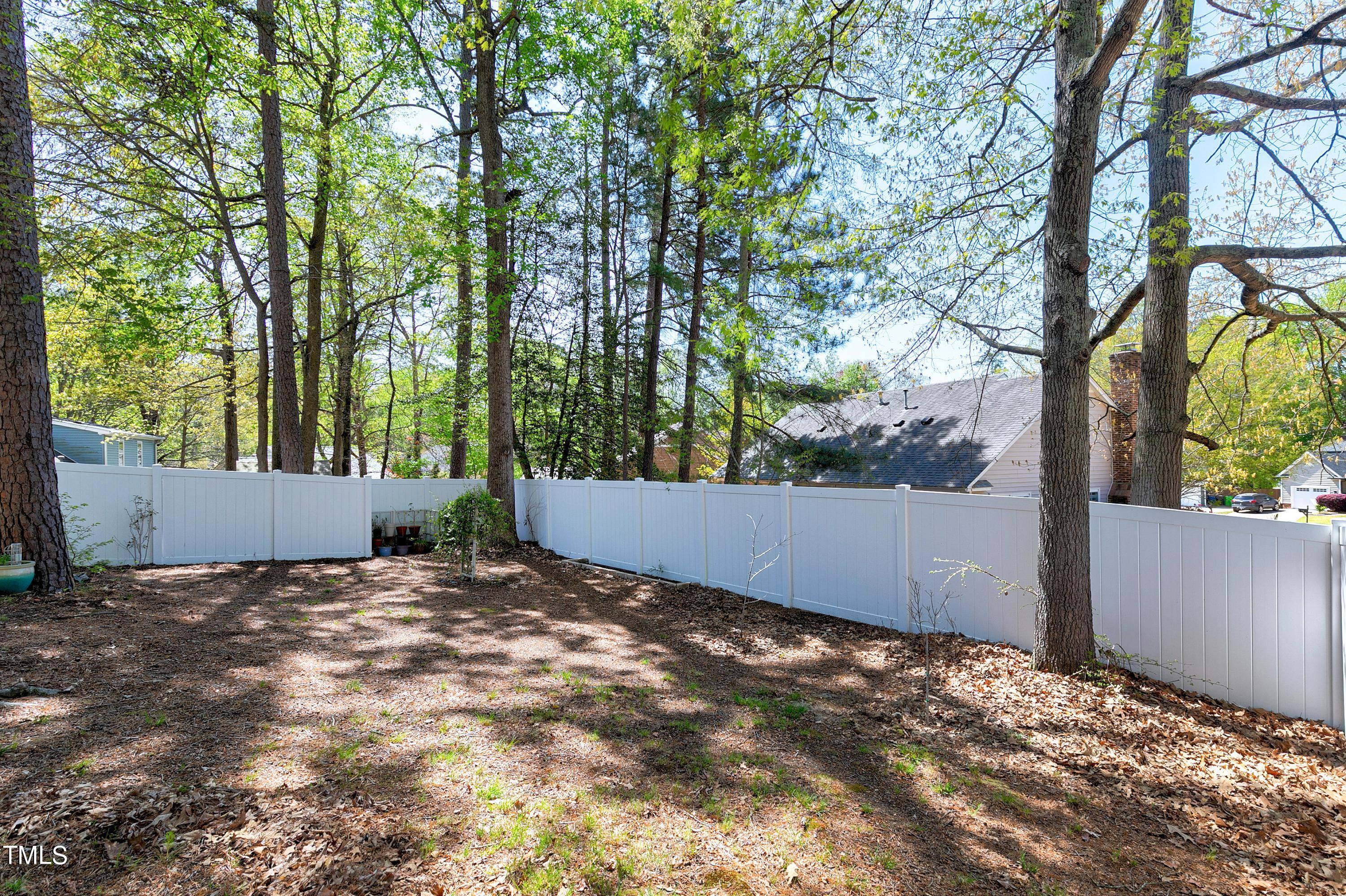 2721 Fernhurst Lane Raleigh, NC 27604 - Photo 14 of 18 Ahh! Breathe!! You will love spending time in the large, fenced yard, with trees providing a canopy for shade. Whether you love to garden, need room for a pet, or enjoy kicking around a soccer ball, you can do all three in this wonderful yard.