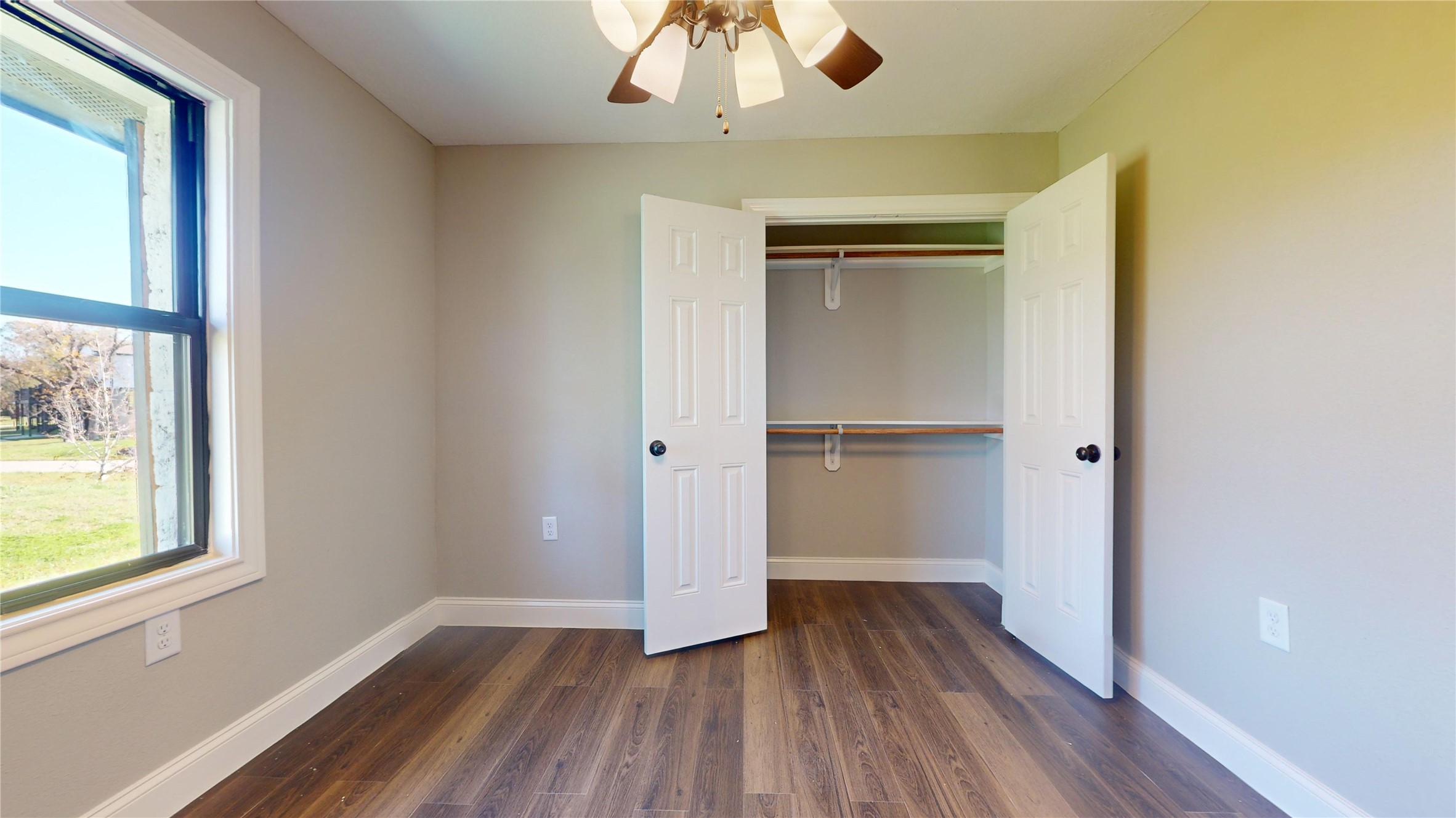 603 Maple Way Houston, TX 77015 - Photo 12 of 35 a view of empty room with wooden floor and fan