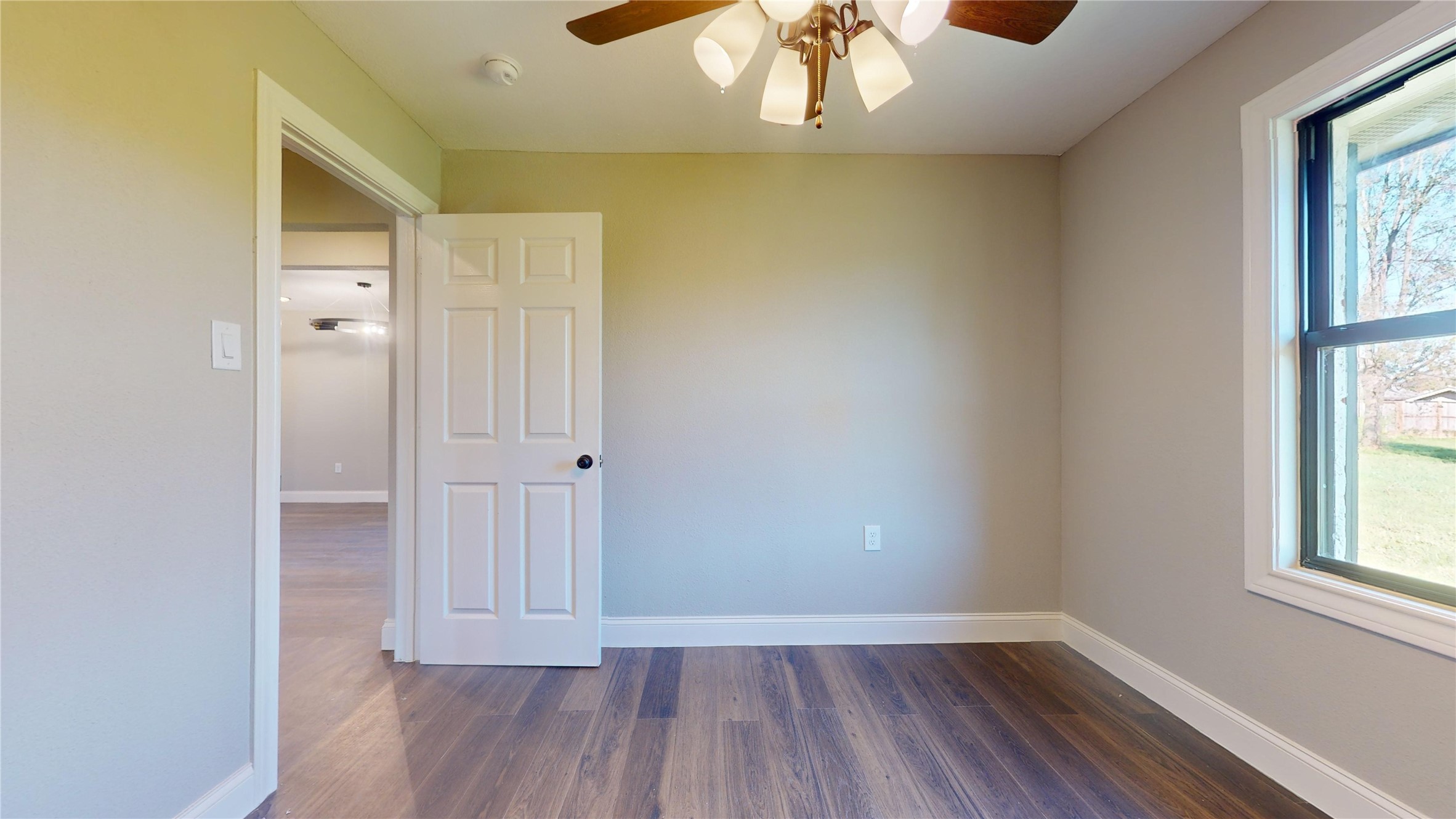 603 Maple Way Houston, TX 77015 - Photo 14 of 35 wooden floor in an empty room with a window