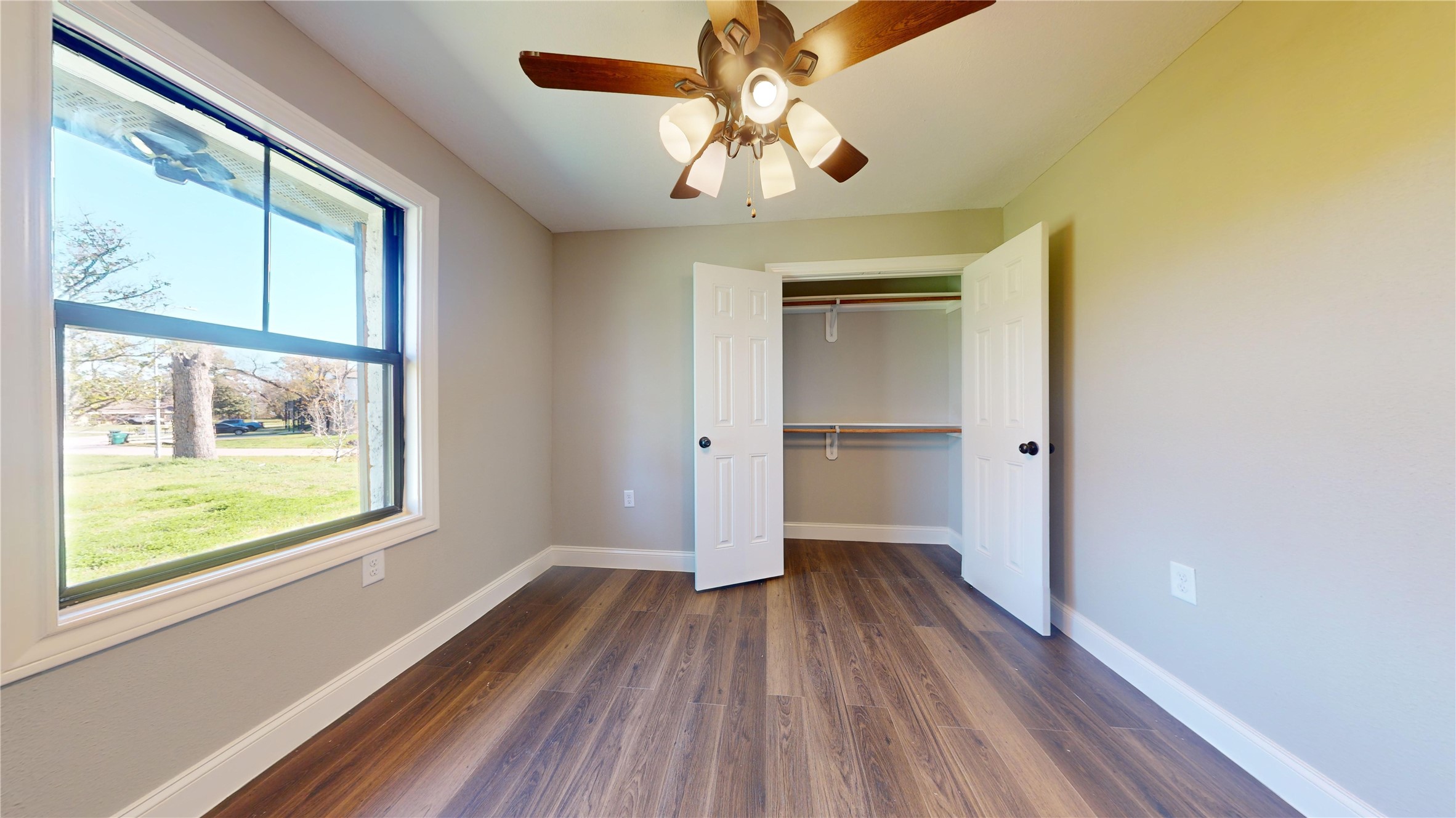 603 Maple Way Houston, TX 77015 - Photo 21 of 35 wooden floor in an empty room with a window