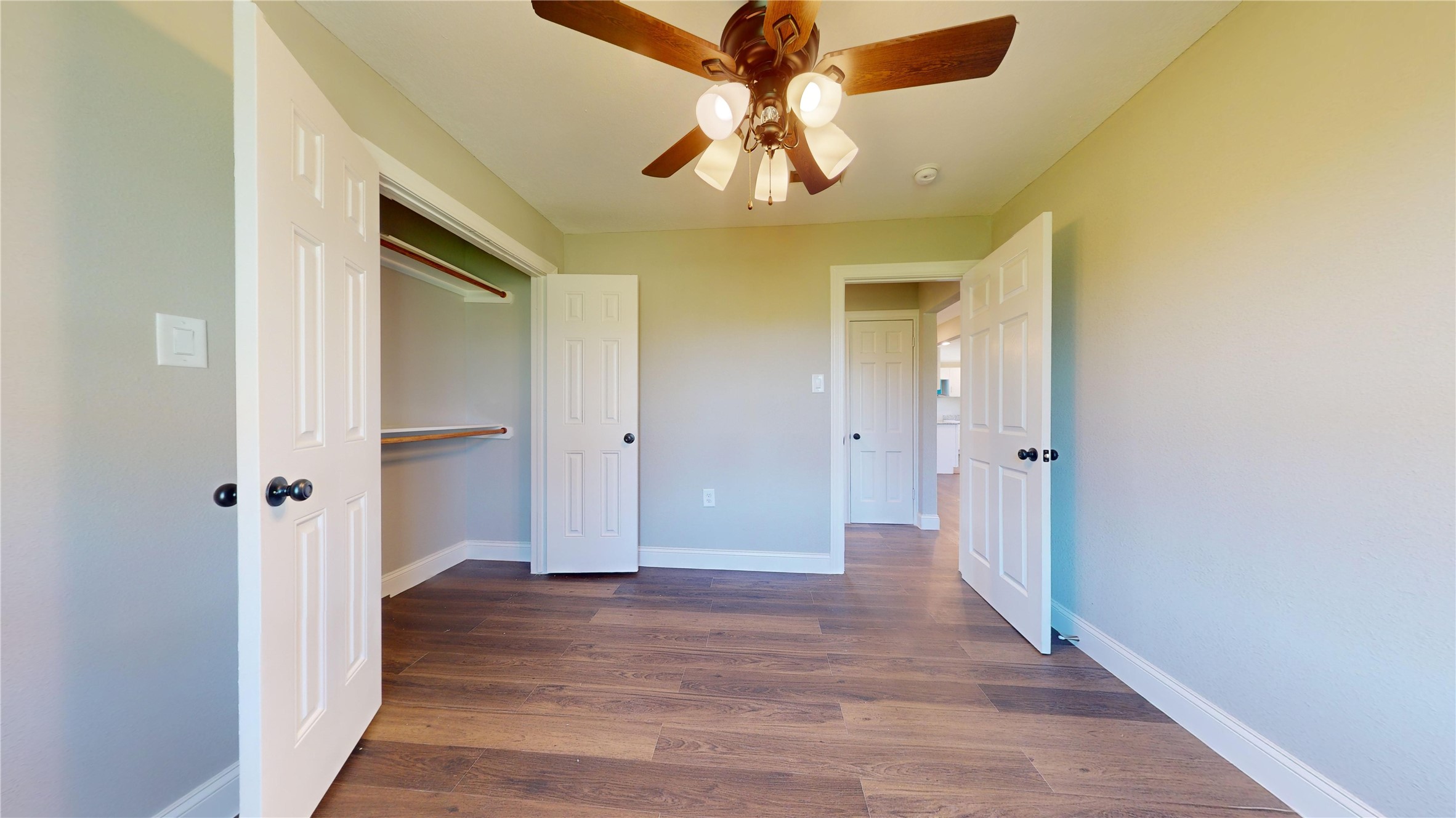 603 Maple Way Houston, TX 77015 - Photo 22 of 35 a view of a hallway with wooden floor