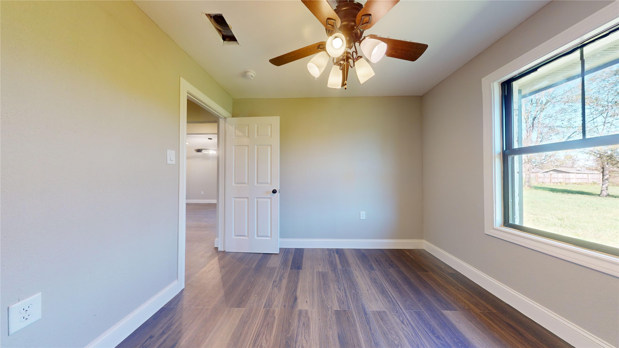 603 Maple Way Houston, TX 77015 - Photo 23 of 35 wooden floor in an empty room with a window