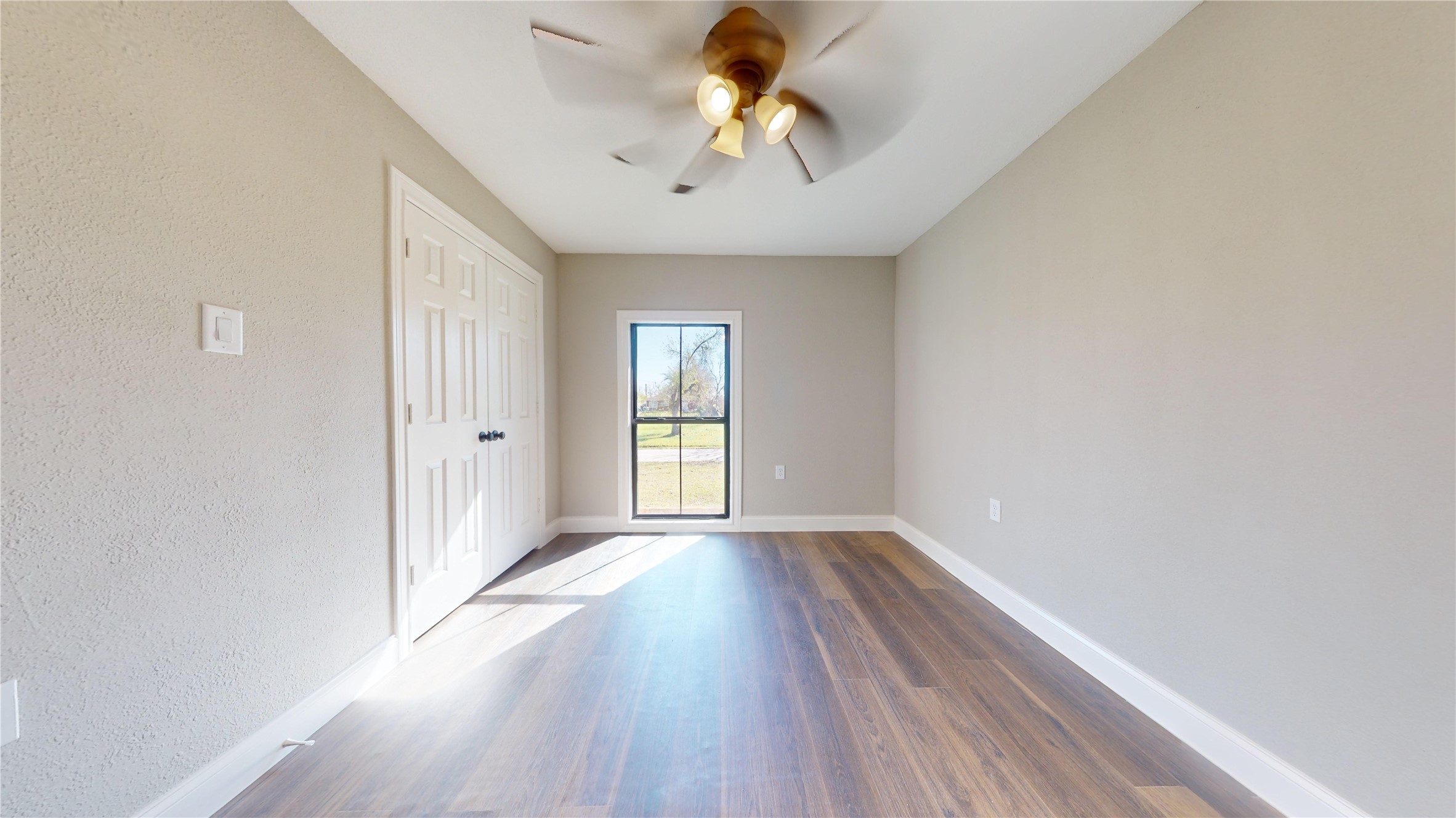 603 Maple Way Houston, TX 77015 - Photo 24 of 35 wooden floor in an empty room with a window