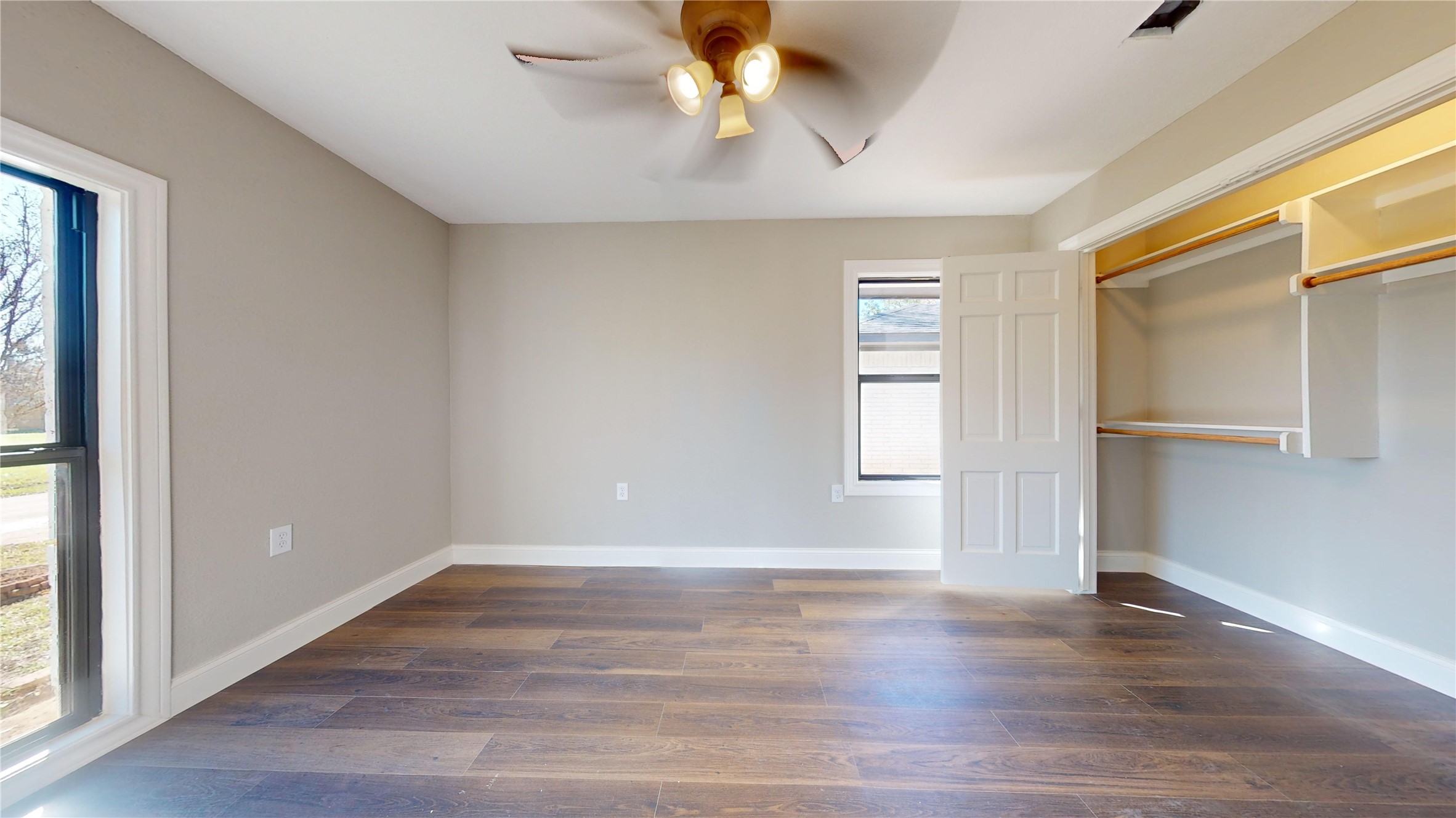 603 Maple Way Houston, TX 77015 - Photo 26 of 35 a view of an empty room with window and wooden floor