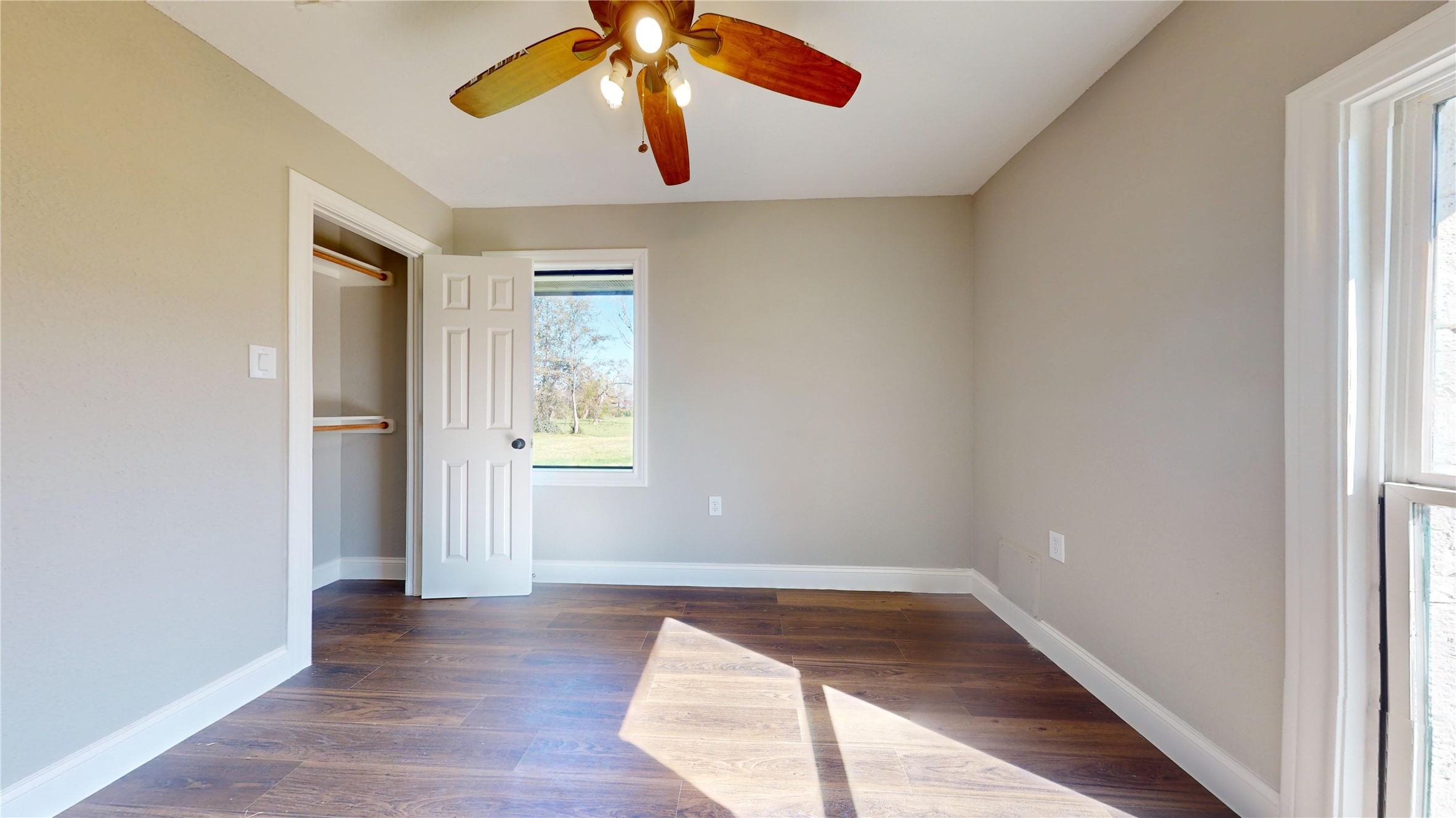 603 Maple Way Houston, TX 77015 - Photo 29 of 35 wooden floor in an empty room with a window