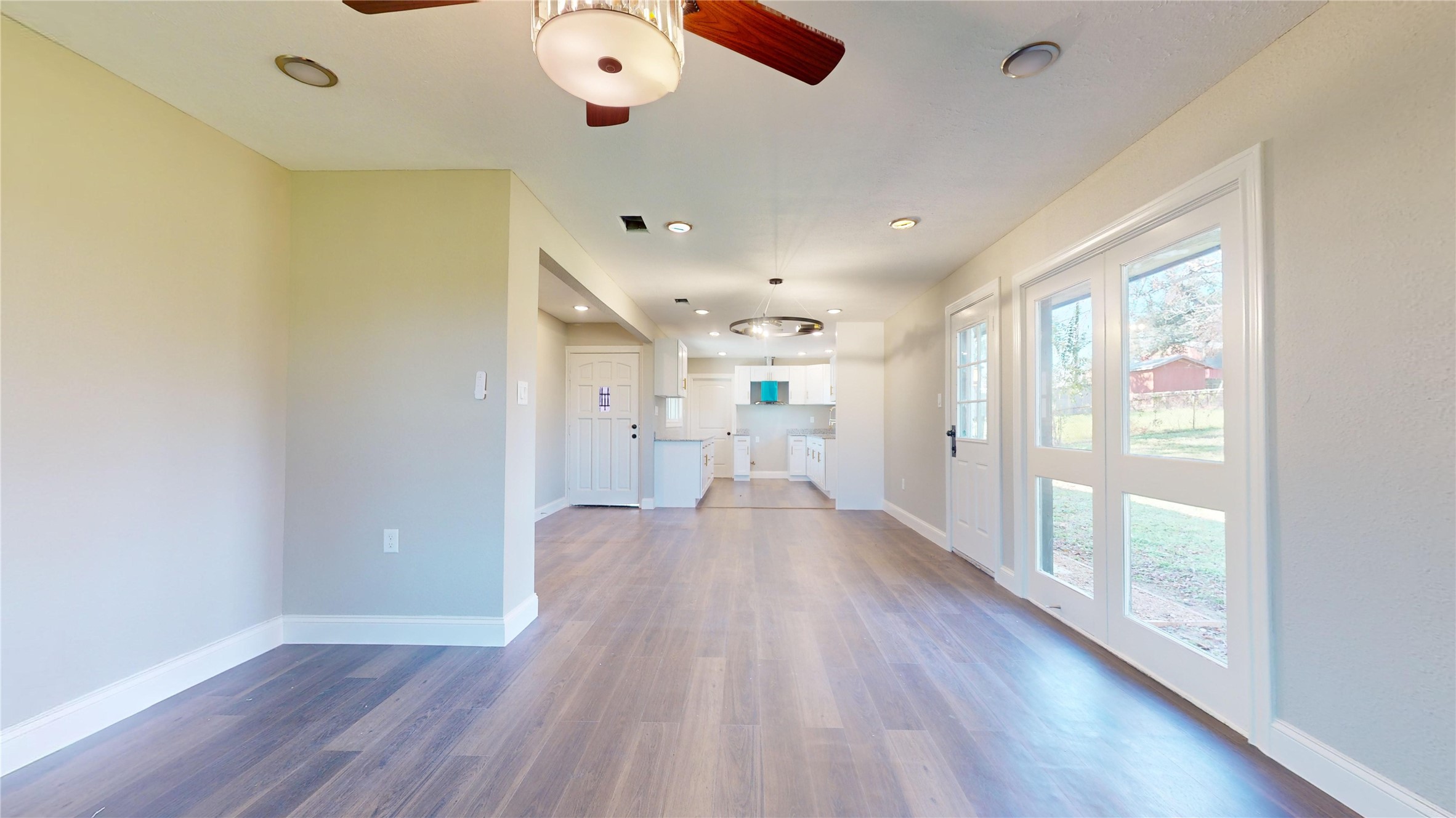 603 Maple Way Houston, TX 77015 - Photo 5 of 35 a view of a hallway with wooden floor