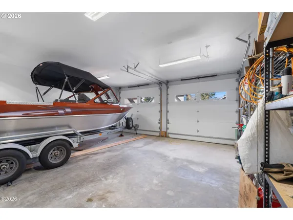 a view of a garage and car parked