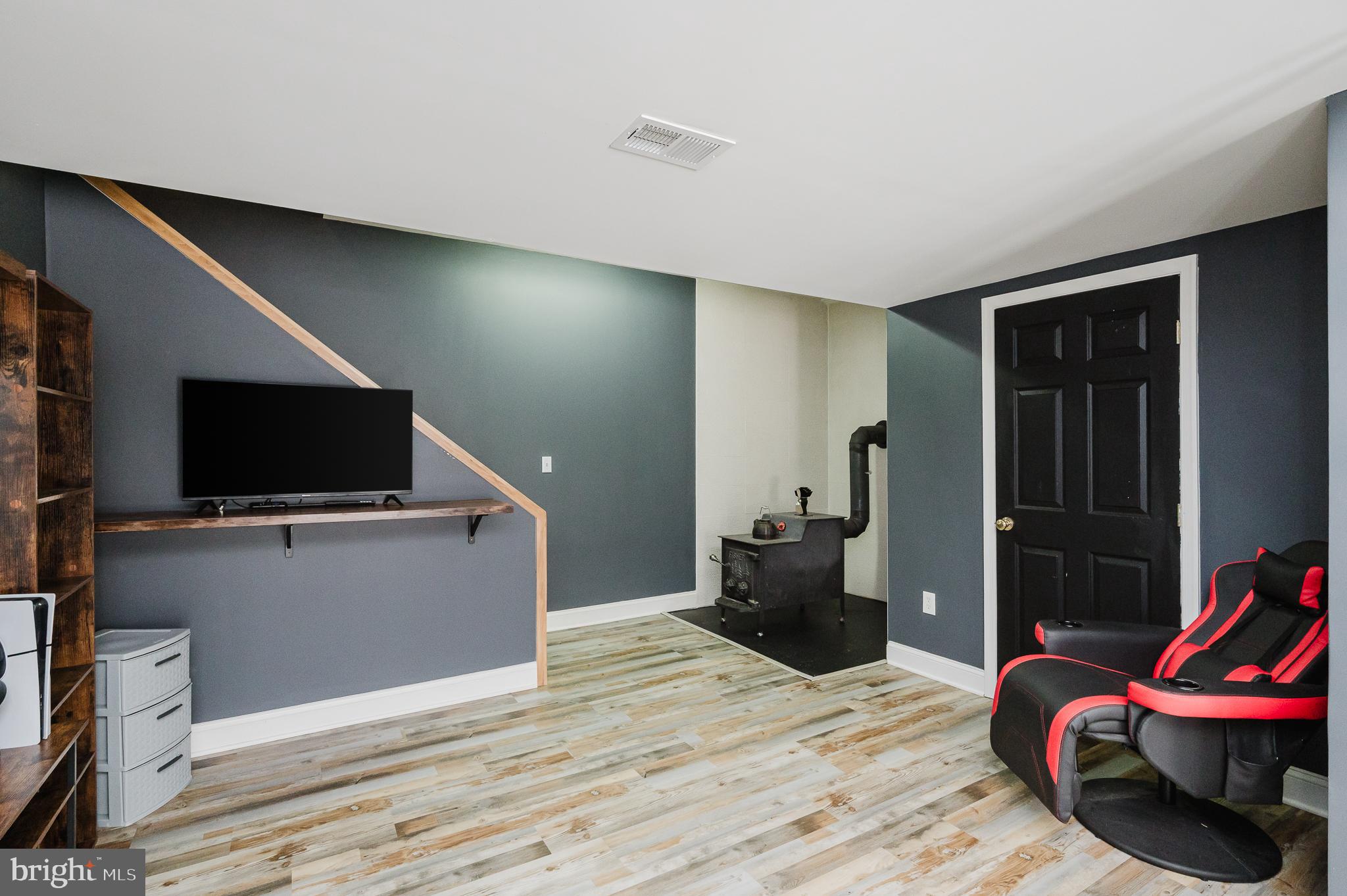305 Crowl Road Westminster, MD 21158 - Photo 19 of 55 Rec room with wood stove