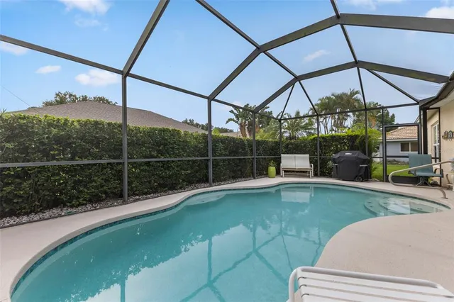a view of a swimming pool with a porch