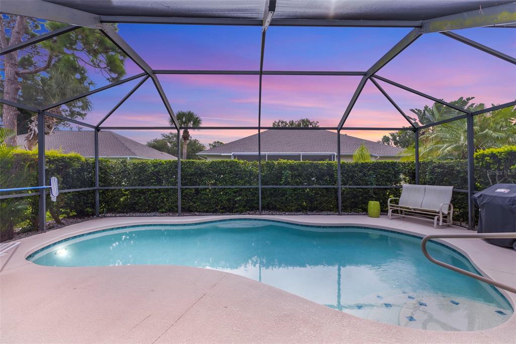 5823 McKinley Road Venice, FL 34293 - Photo 2 of 44 a view of a swimming pool with a patio