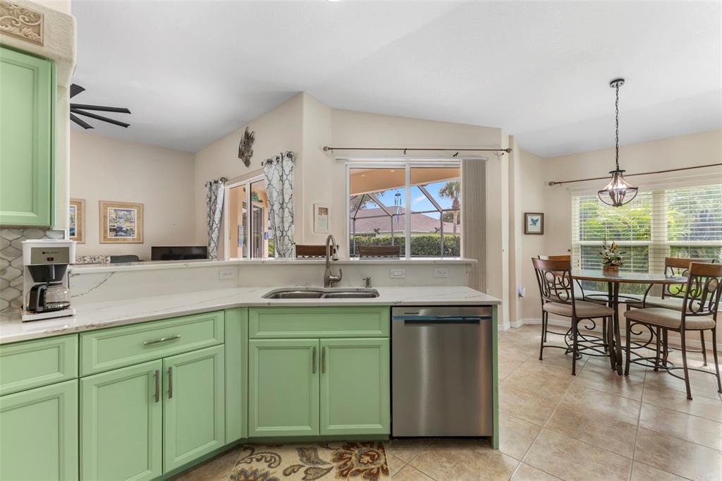 5823 McKinley Road Venice, FL 34293 - Photo 31 of 44 a kitchen with sink and cabinets