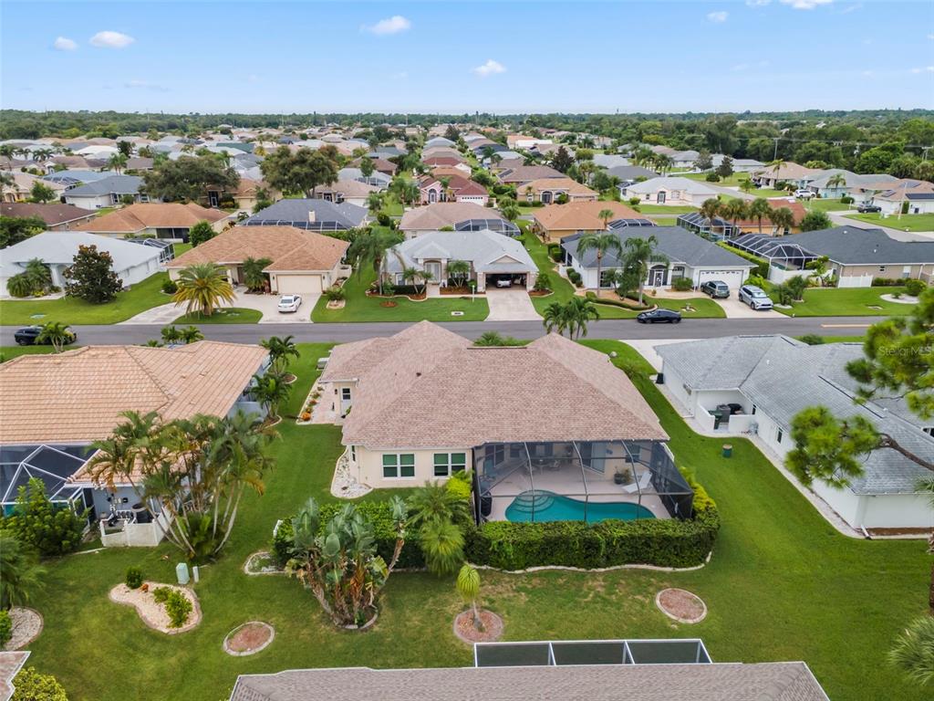 5823 McKinley Road Venice, FL 34293 - Photo 37 of 44 an aerial view of residential houses with outdoor space
