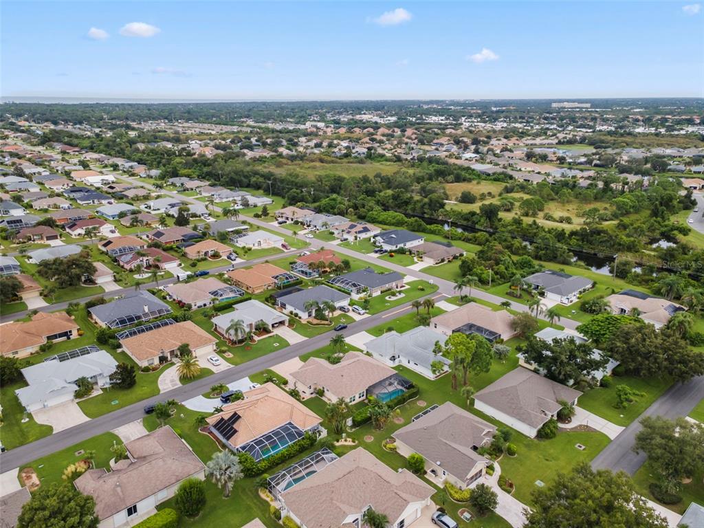 5823 McKinley Road Venice, FL 34293 - Photo 38 of 44 an aerial view of residential houses with outdoor space