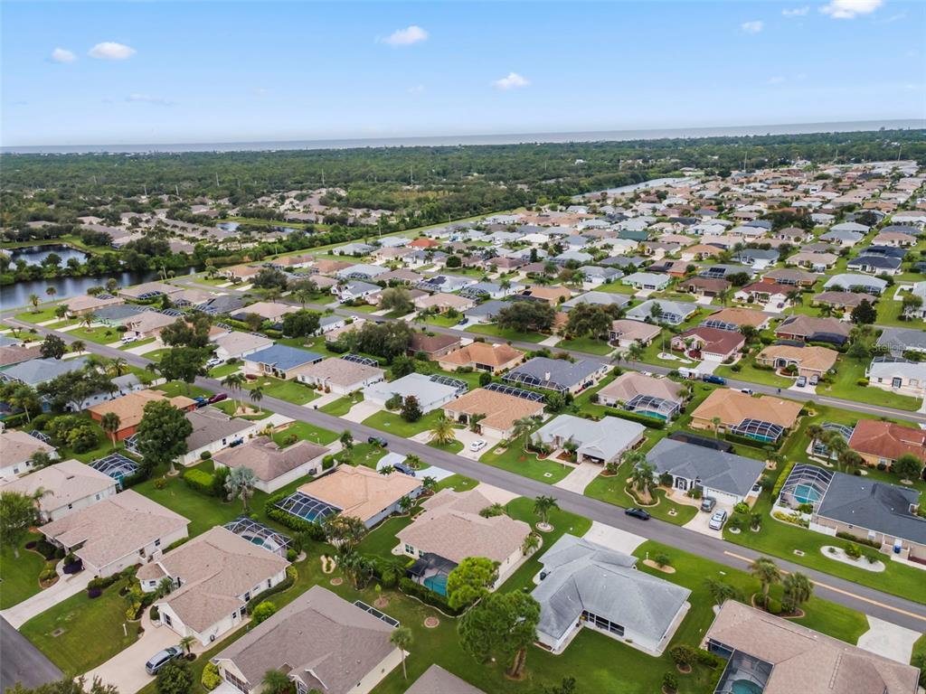 5823 McKinley Road Venice, FL 34293 - Photo 39 of 44 an aerial view of residential houses with outdoor space