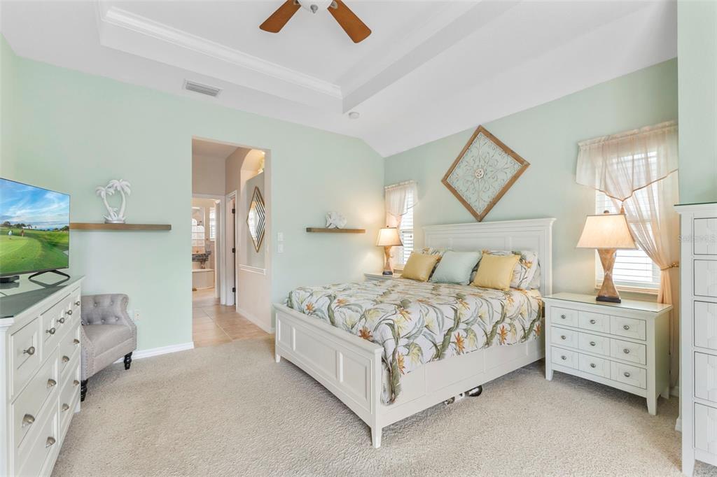 5823 McKinley Road Venice, FL 34293 - Photo 42 of 44 a bedroom with a bed and a cabinets