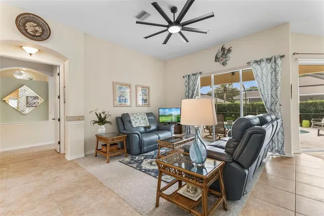 a living room with furniture and a window