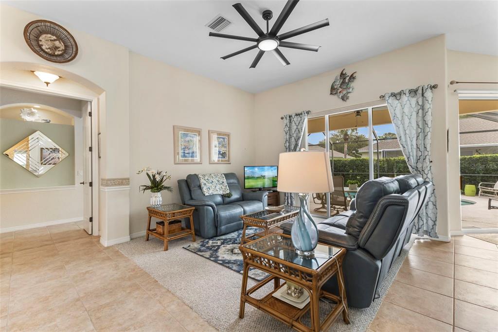 5823 McKinley Road Venice, FL 34293 - Photo 7 of 44 a living room with furniture and a window