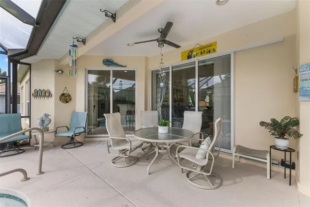 a view of a dinning area with furniture and a window