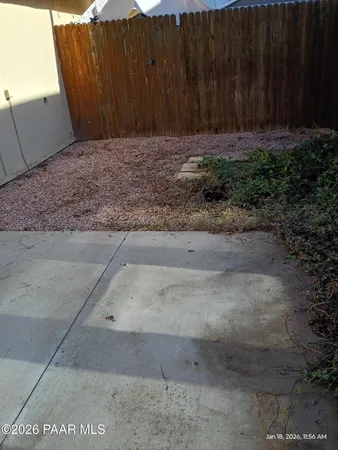 a view of a wrought iron fences in front of house
