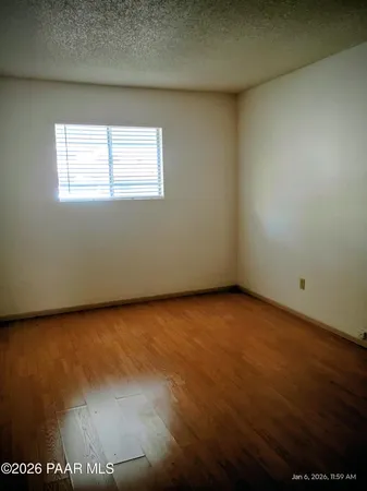 a view of a room that has a window