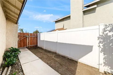 a view of a back yard of the building