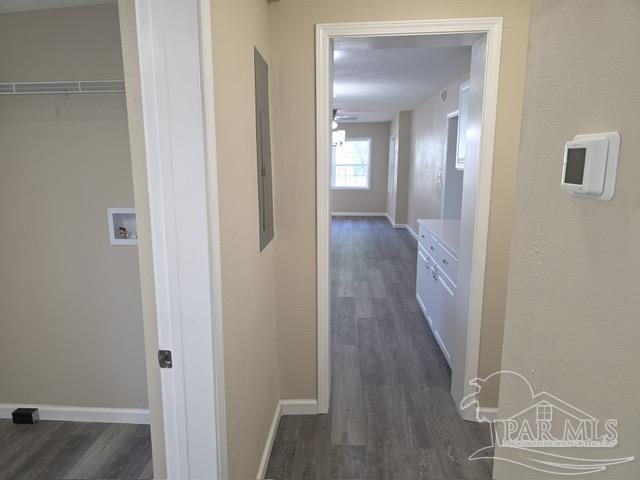 4001 Harrison Avenue Jay, FL 32565 - Photo 18 of 20 a view of a hallway with wooden floor