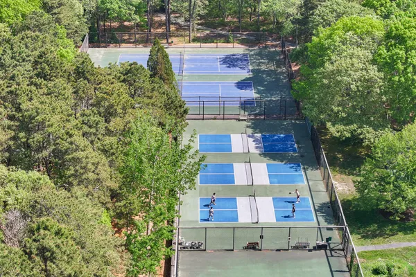 a bathroom with a sink mirror and vanity
