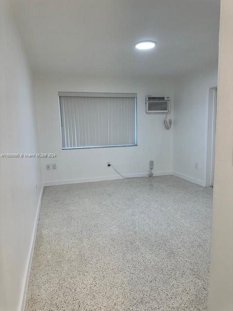 3677 Southwest 14th Street Miami, FL 33145 - Photo 6 of 12 an empty room with a empty space and windows