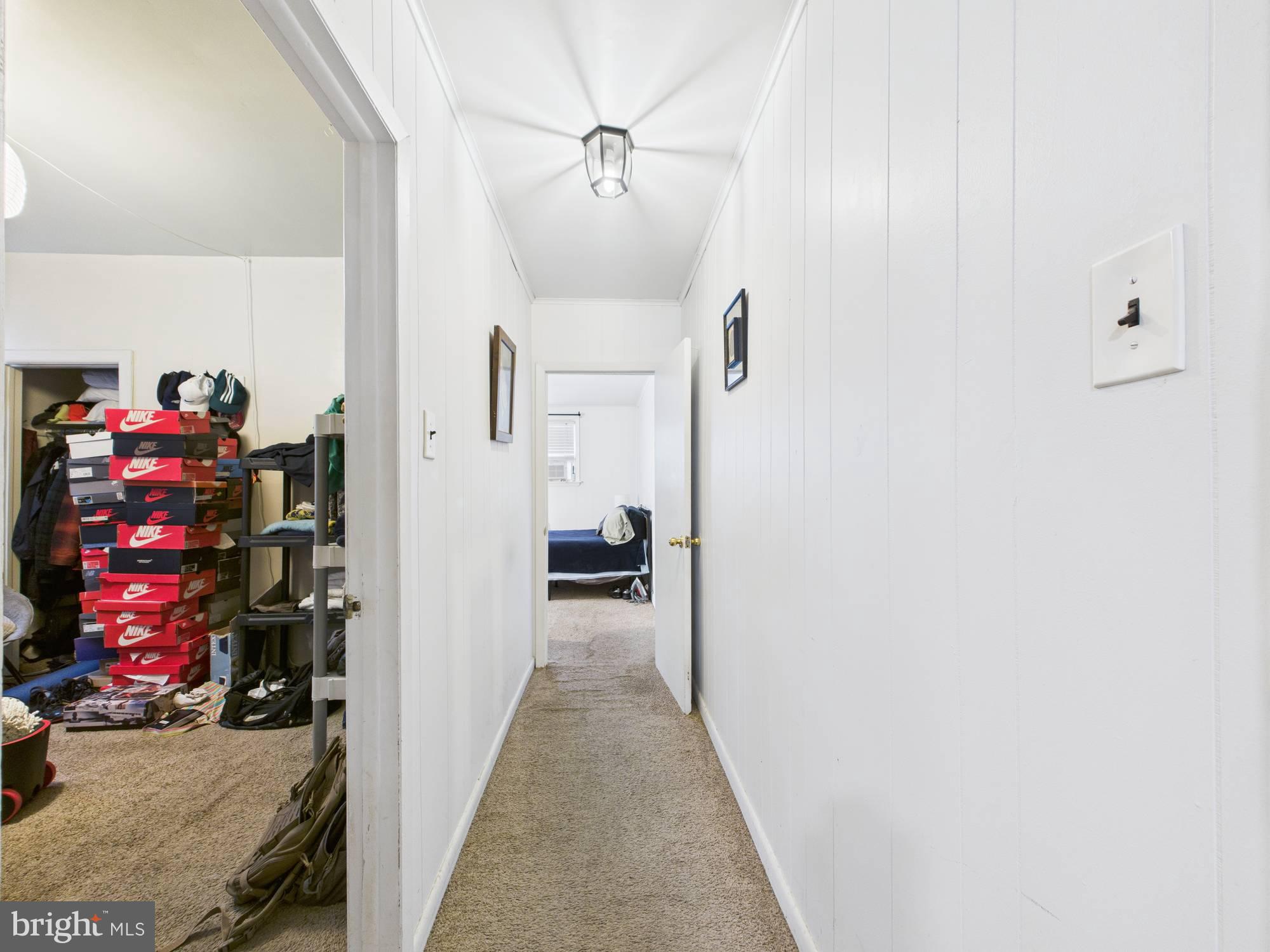 4073 West Ford Road Philadelphia, PA 19131 - Photo 16 of 50 a view of a hallway with a dining room and entryway