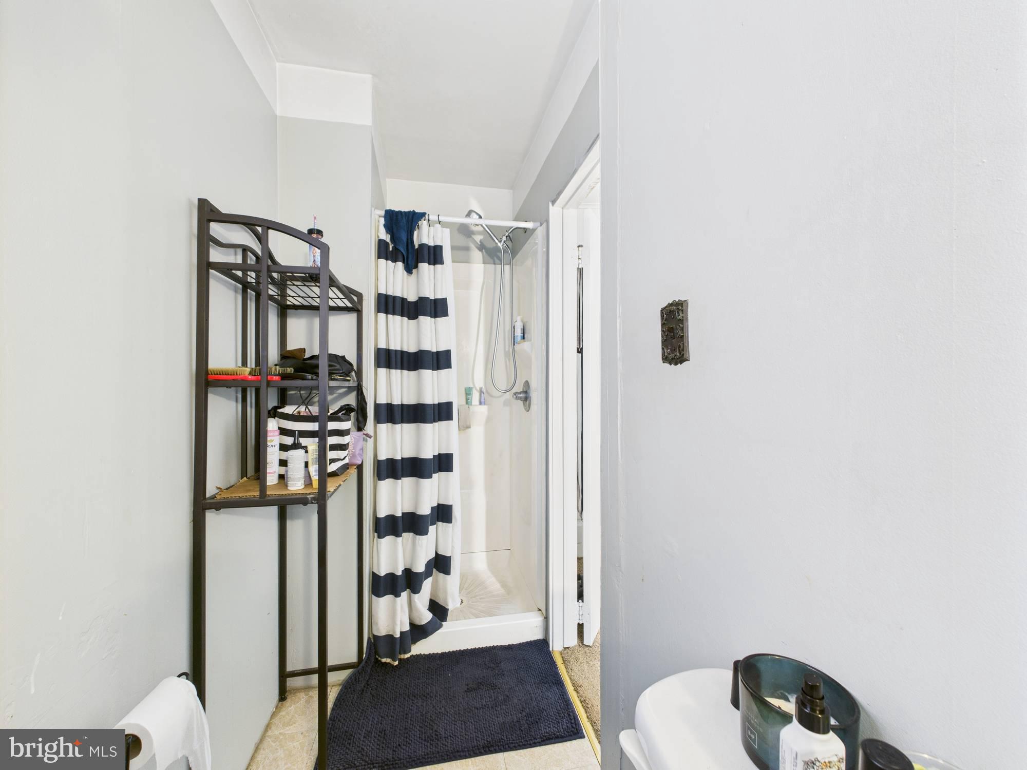 4073 West Ford Road Philadelphia, PA 19131 - Photo 24 of 50 a view of walk in closet with clothes and shoes