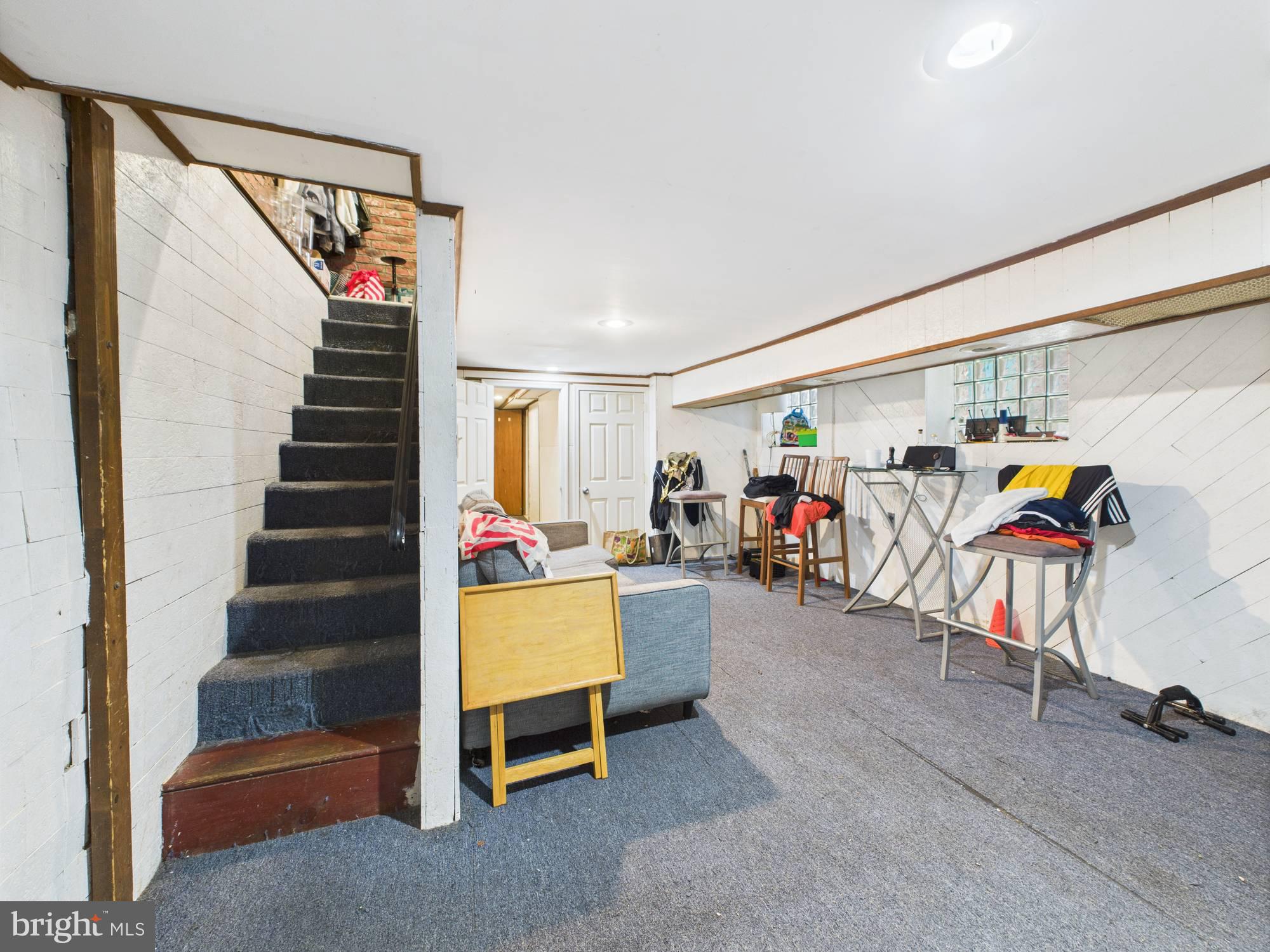 4073 West Ford Road Philadelphia, PA 19131 - Photo 27 of 50 a view of a livingroom with furniture and staircase