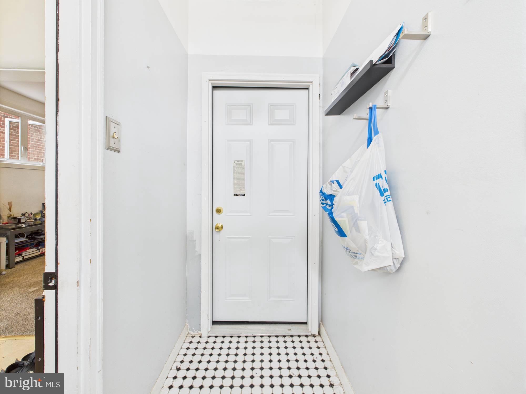 4073 West Ford Road Philadelphia, PA 19131 - Photo 8 of 50 a view of a hallway with wooden floor and entryway