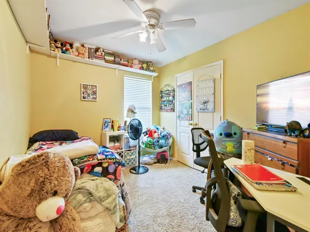 a bathroom with a sink double vanity and a mirror
