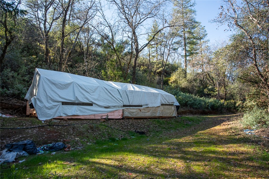 0 Condor Road Oroville, CA 95965 - Photo 20 of 29 a backyard of a house with lots of green space
