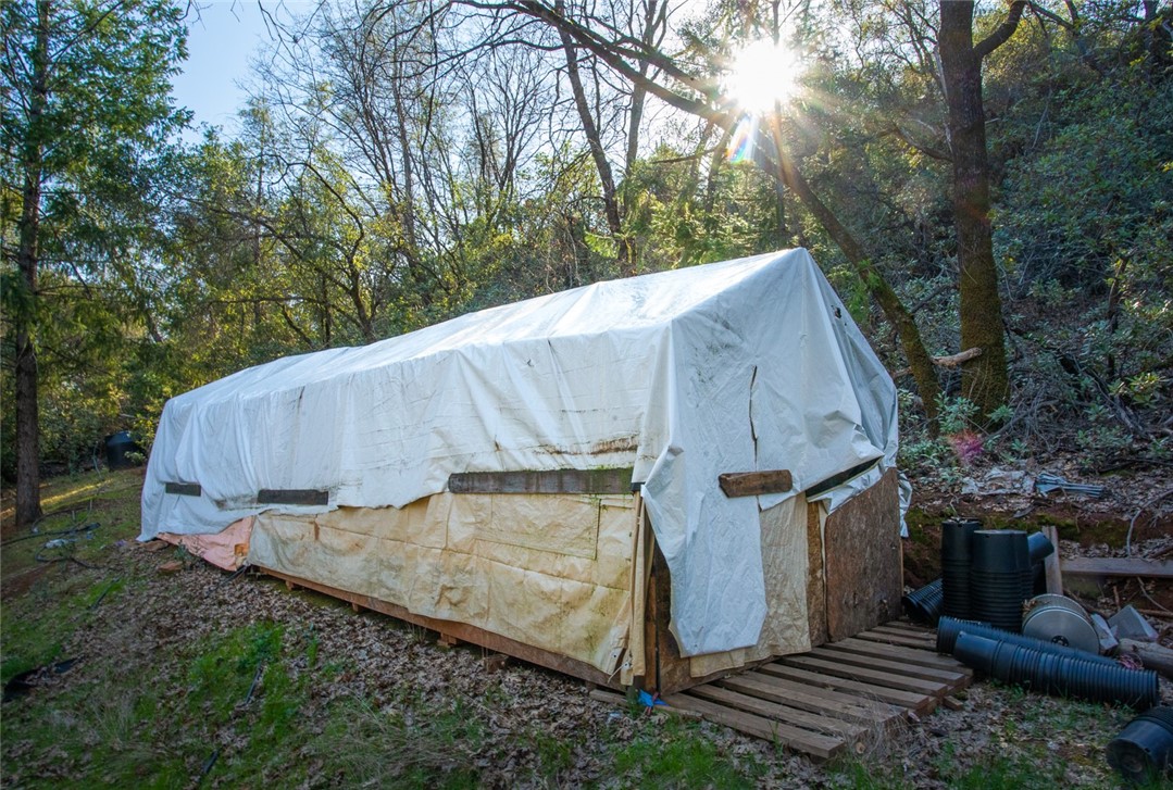 0 Condor Road Oroville, CA 95965 - Photo 21 of 29 a view of a barn in the middle of a yard