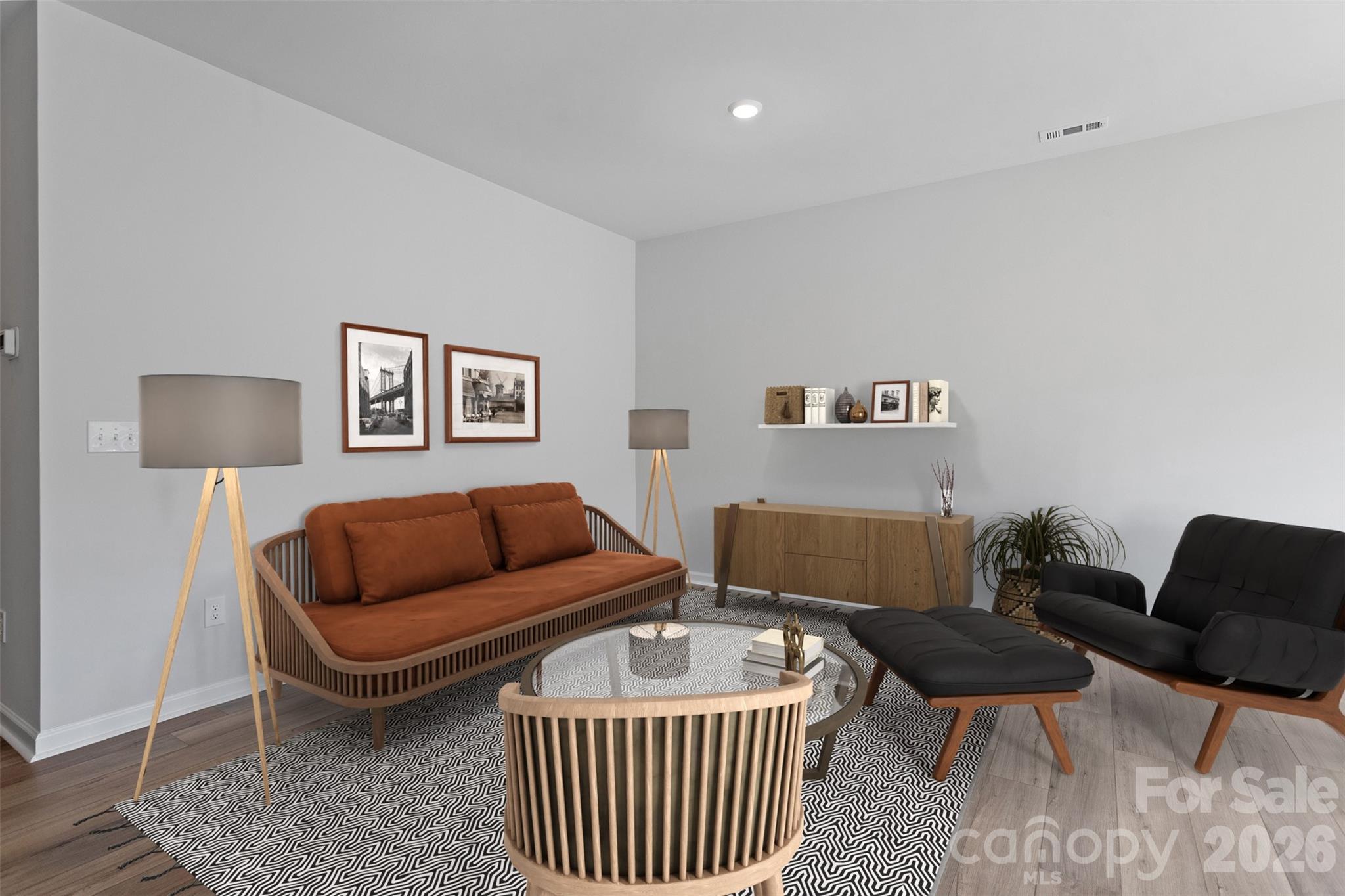 3017 Kingsfield Road, Unit 49 Charlotte, NC 28208 - Photo 2 of 10 a living room with furniture and a lamp