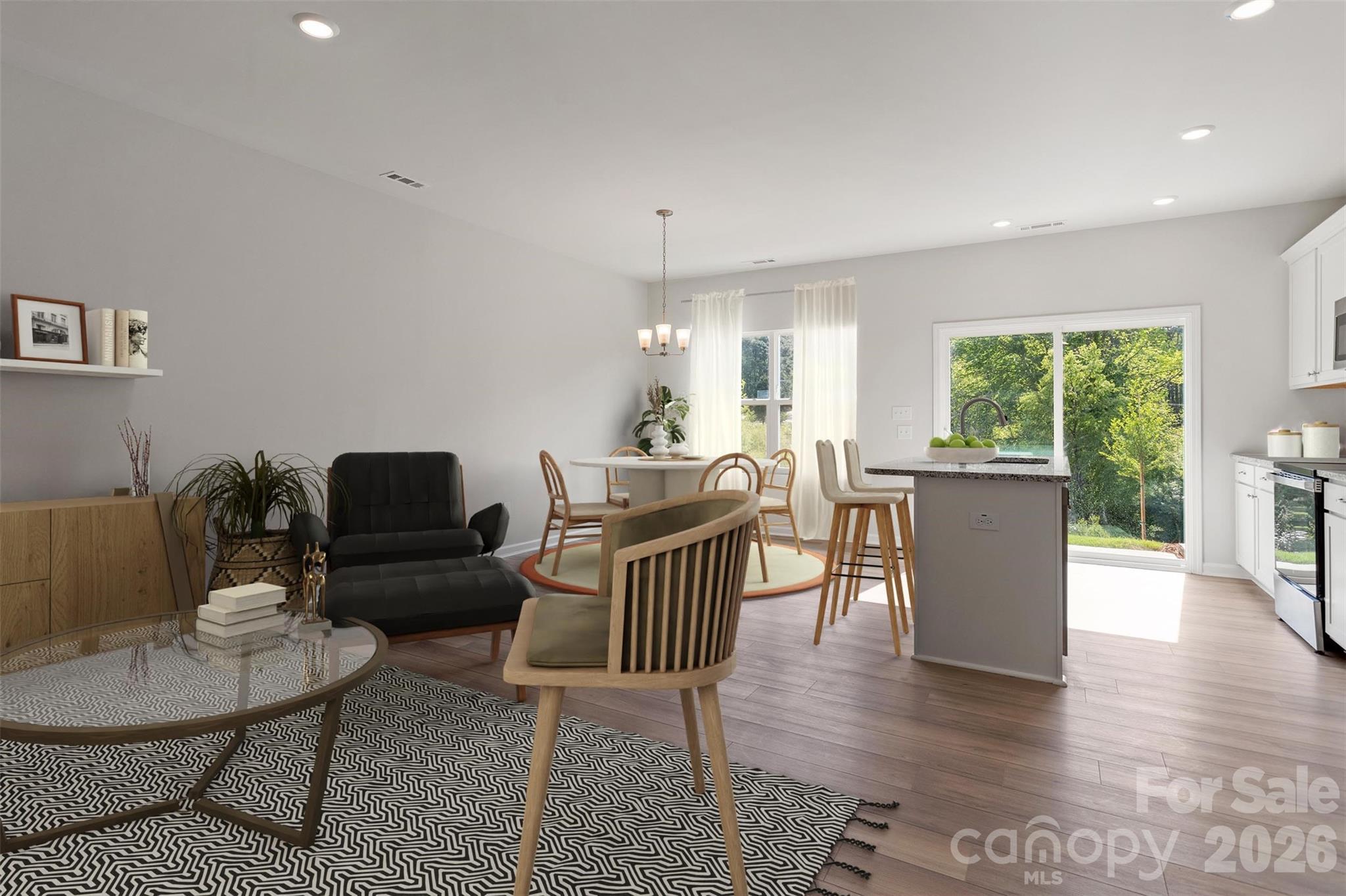 3017 Kingsfield Road, Unit 49 Charlotte, NC 28208 - Photo 3 of 10 a living room with furniture and a wooden floor