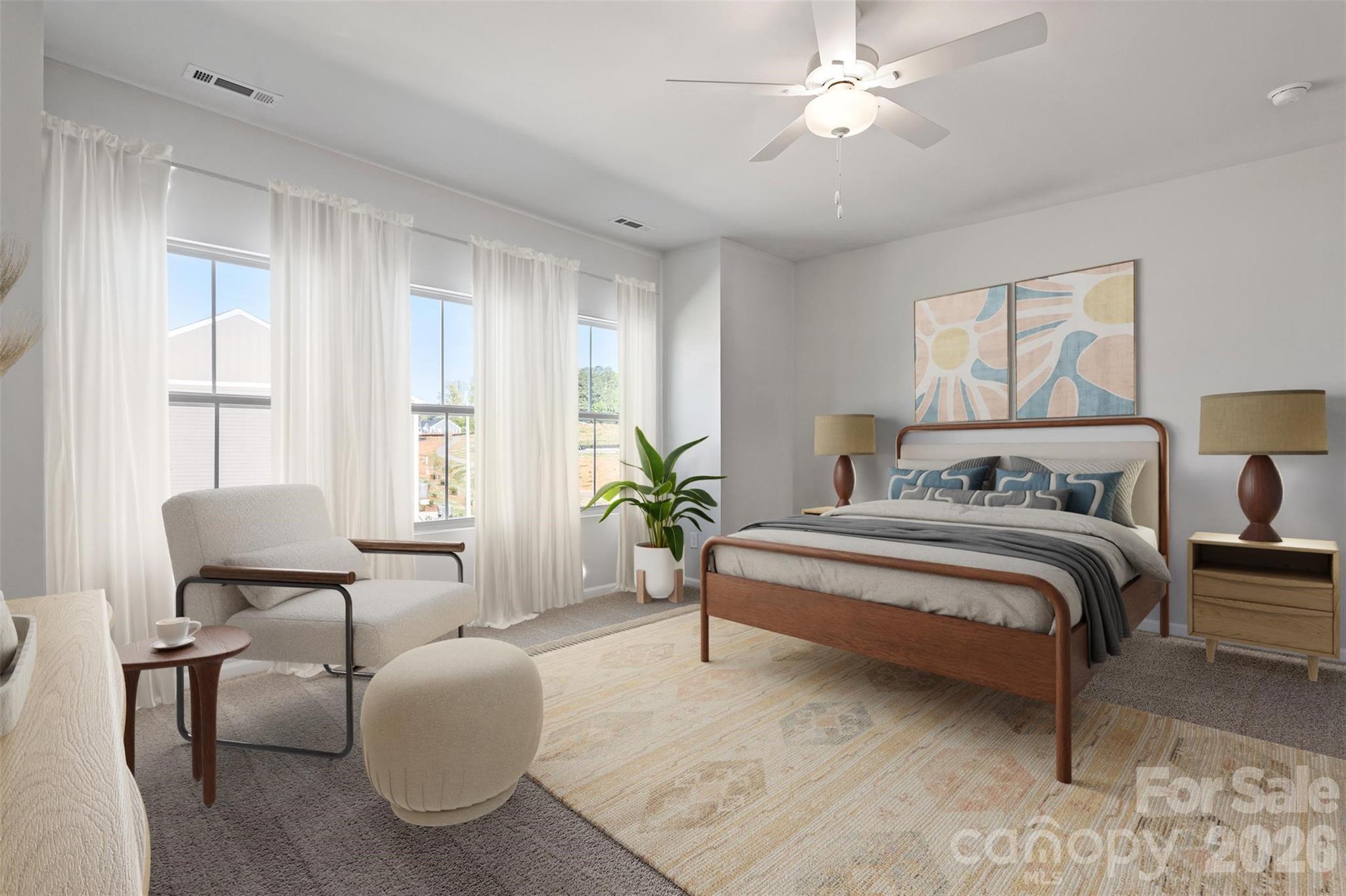 3017 Kingsfield Road, Unit 49 Charlotte, NC 28208 - Photo 7 of 10 a spacious bedroom with a bed and a chandelier