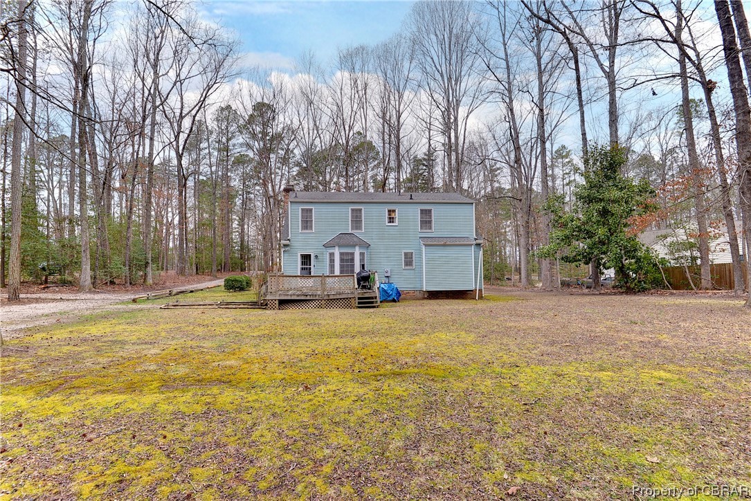 5301 North Courthouse Road Providence Forge, VA 23140 - Photo 24 of 26 a view of a house with a yard and large trees