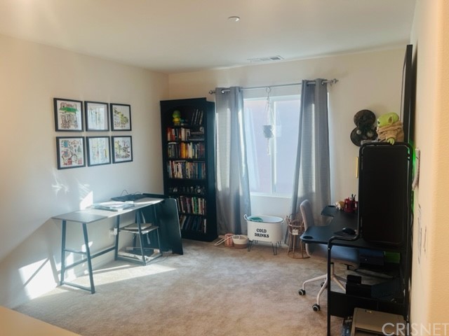 610 West Woodcrest Street Rialto, CA 92376 - Photo 11 of 33 a view of a room with gym equipment