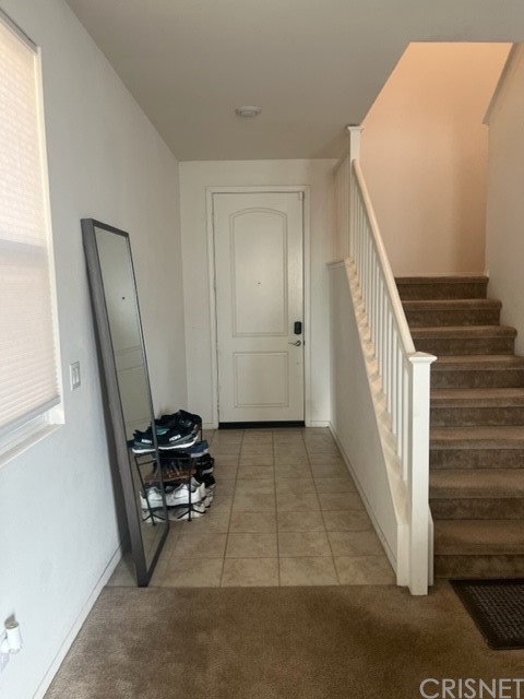 610 West Woodcrest Street Rialto, CA 92376 - Photo 3 of 33 a view of a hallway with workspace
